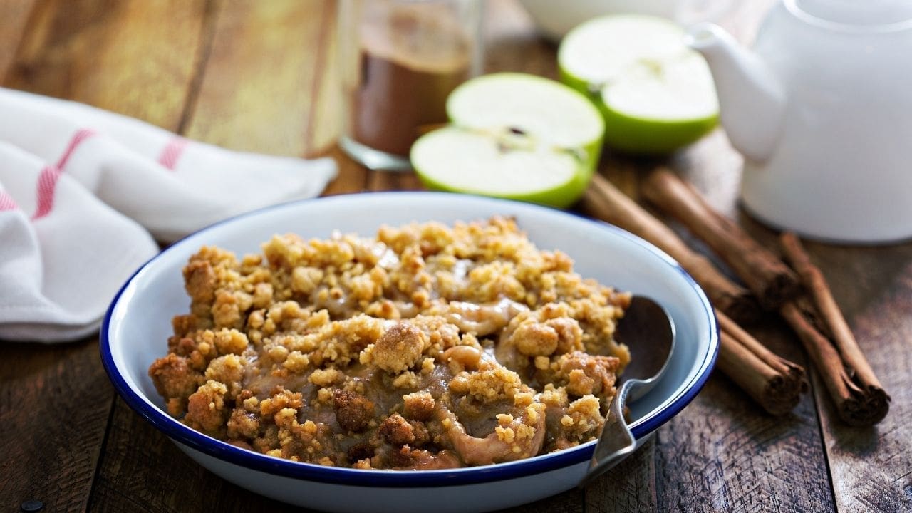 Delia Smith apple crumble in a baking dish, served warm